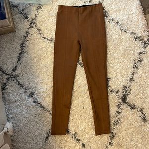 Stretch brown legging pants.